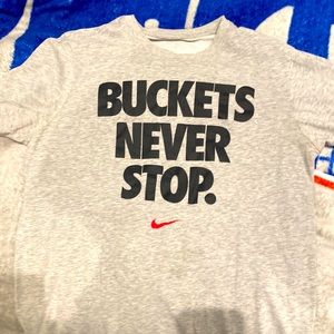 “Buckets never stop” Nike t-shirt